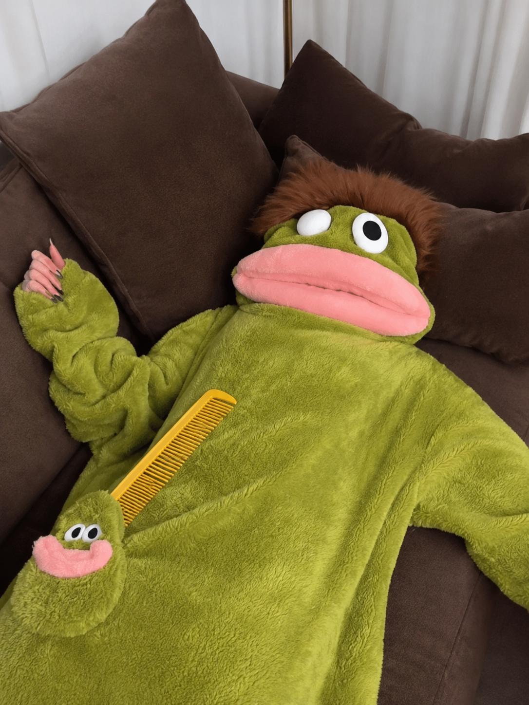 Green Huggybuddies onesie with mega comb